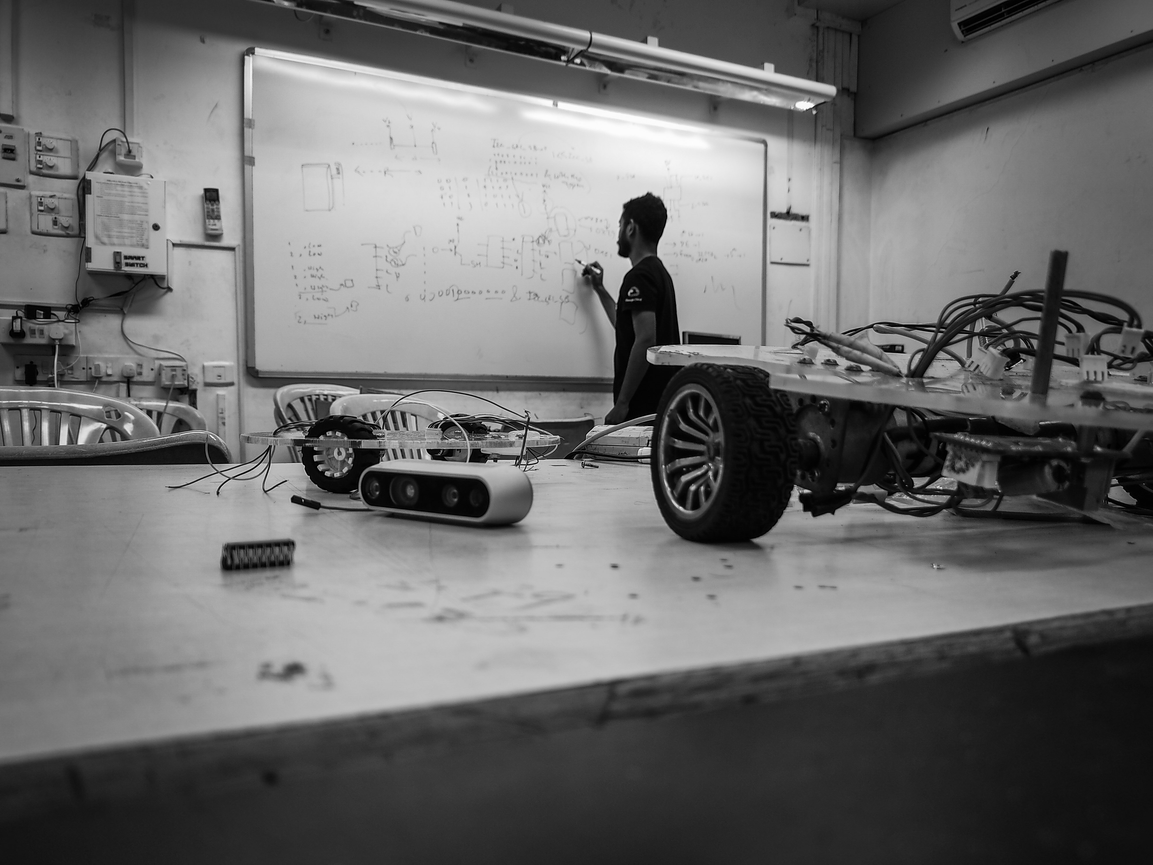 Working through kinematics on the whiteboard